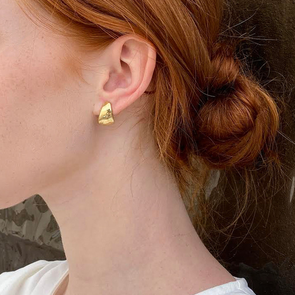Organic shaped bold hugiges earrings. 14k gold sculptural studs
