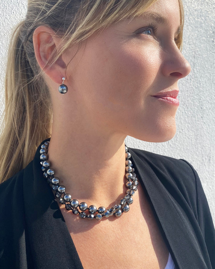 Dark grey pearl jewelry collection of necklaces and earrings by Desideri design
