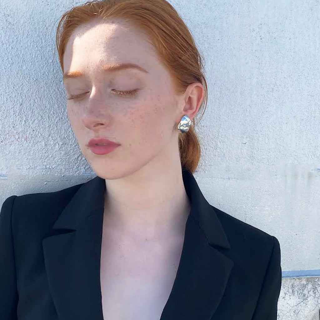 organic shaped large silver earrings. Sculptural studs