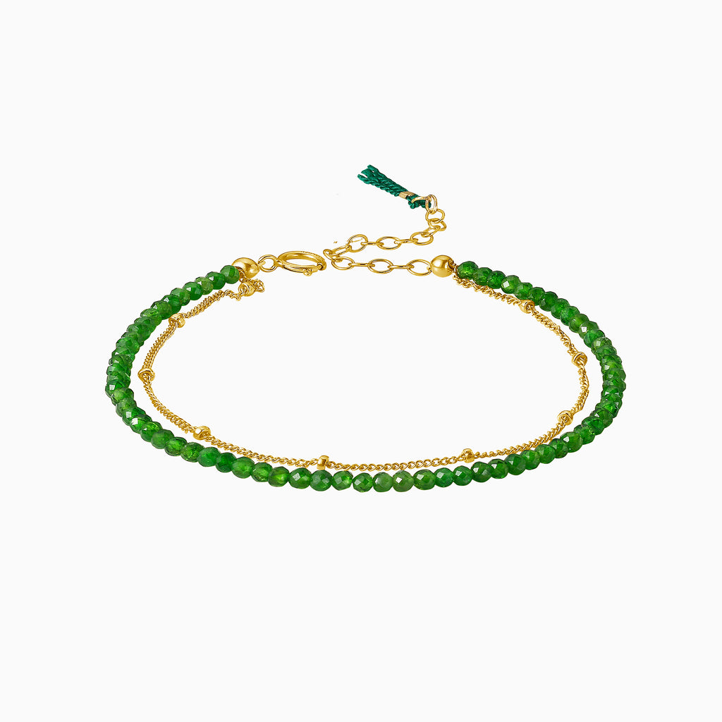 Emeral green beads bracelet with gold chain and silk tassel by Desideri design