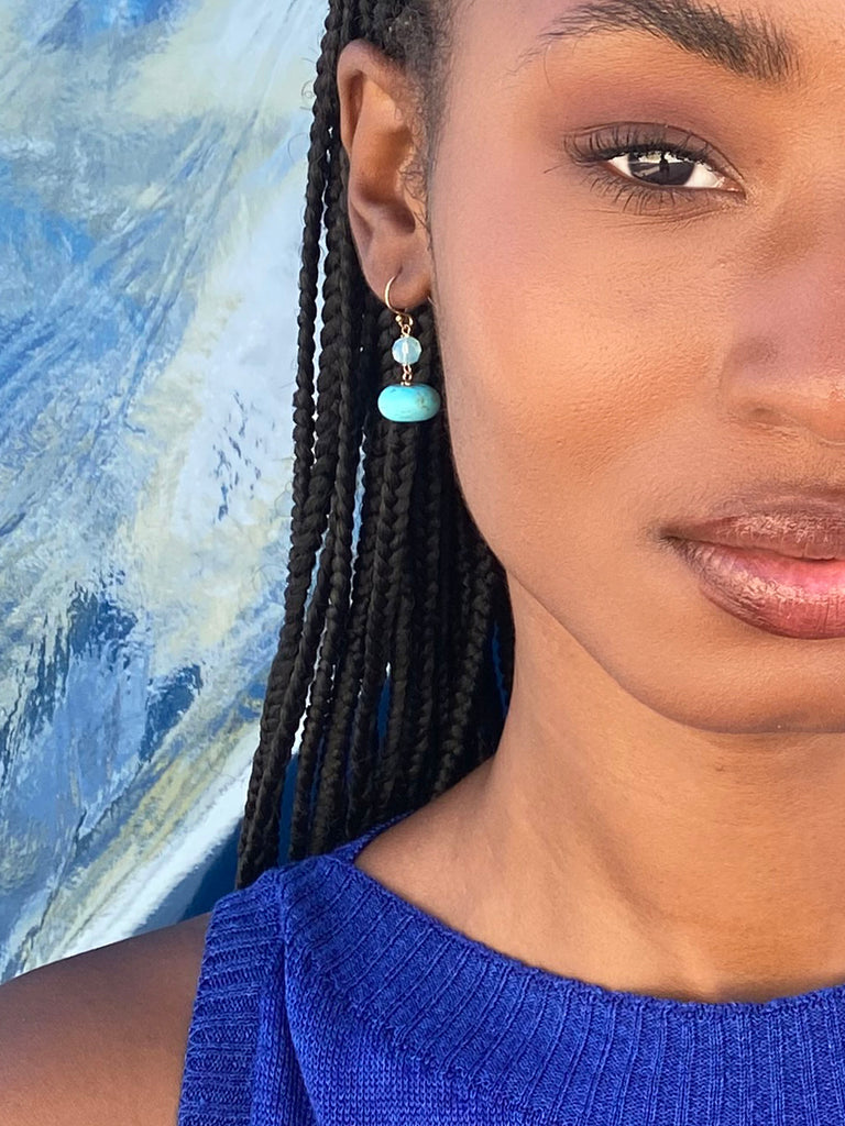 Turquoise and crystals dangling earrings. black model 