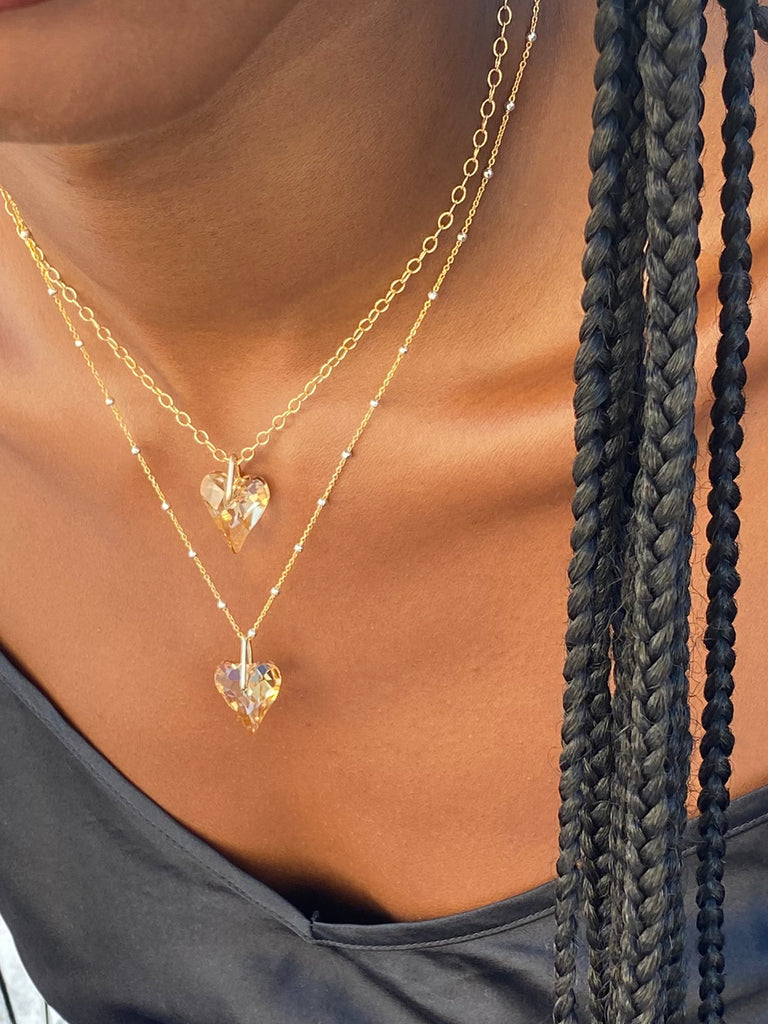 gold earts necklace layering stale