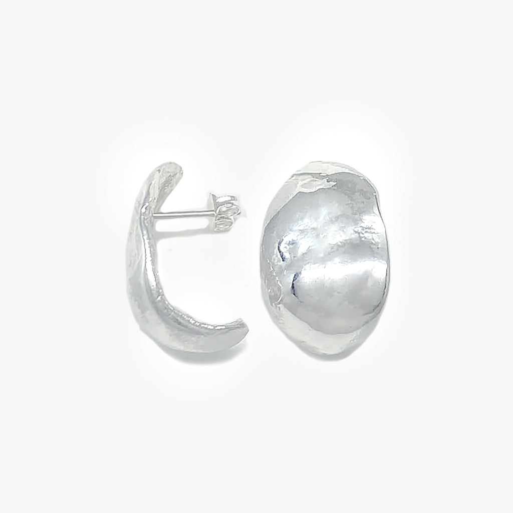 Large organic shaped silver earrings. Bold earrings.Sculptural studs.