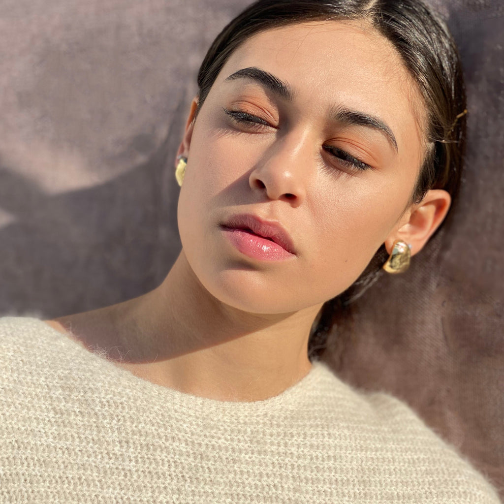 gold organic shaped bold earrings. Sculptural studs by Desideri design