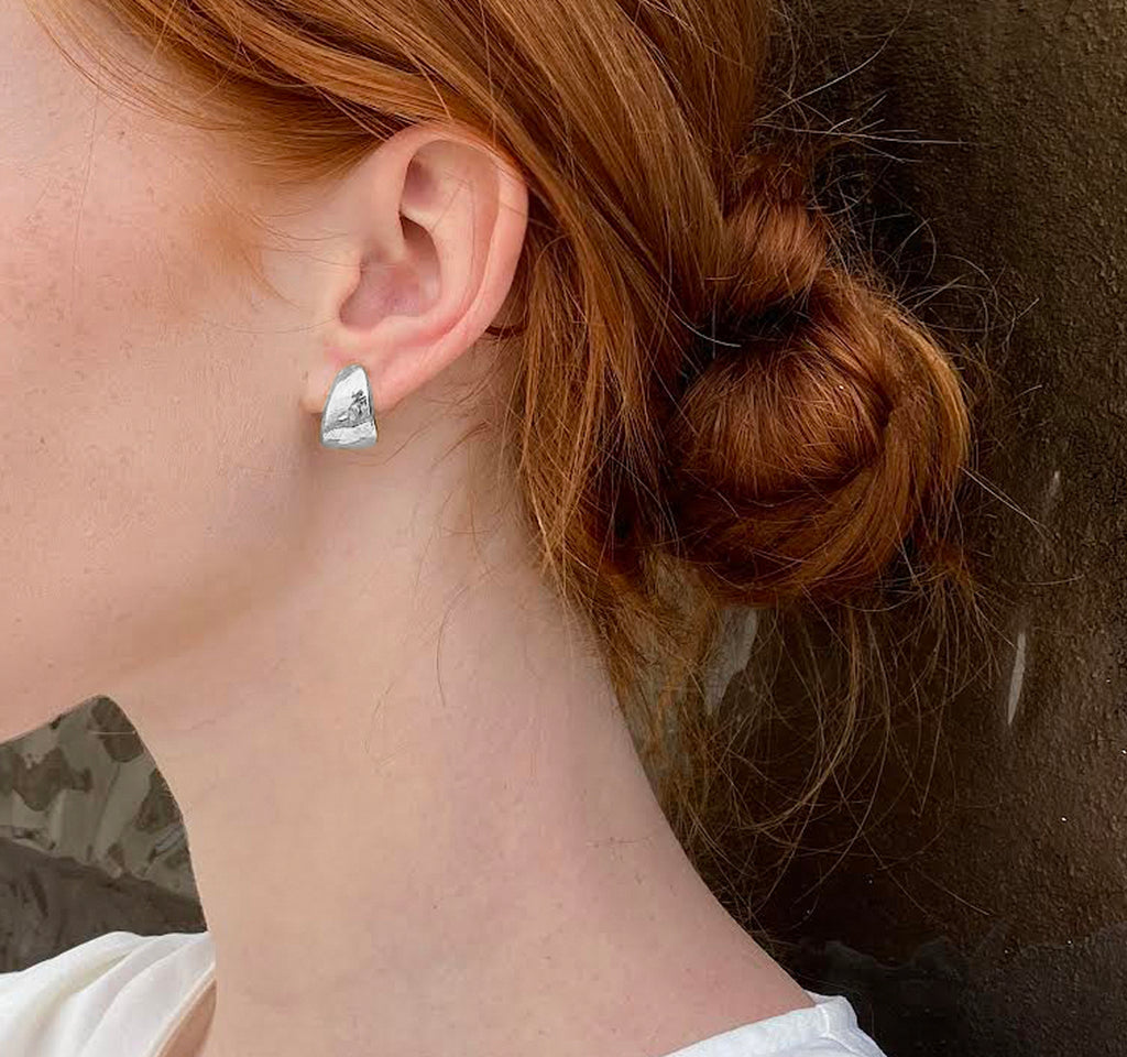 Sculptural silver studs earrings by desideri design