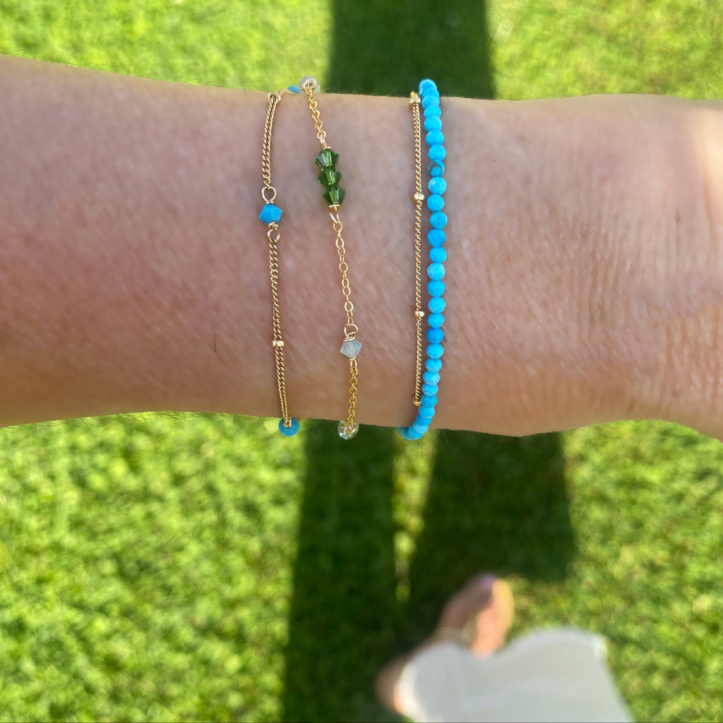 Delicate turquoise blue and green crystals bracelets with silk tassel