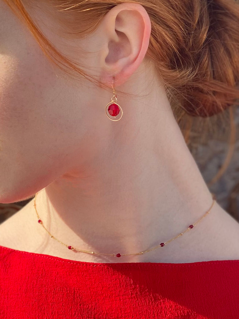 Gold Ruby red dangling earrings