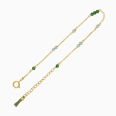 green crystals gold bracelet with tassel. adjustable