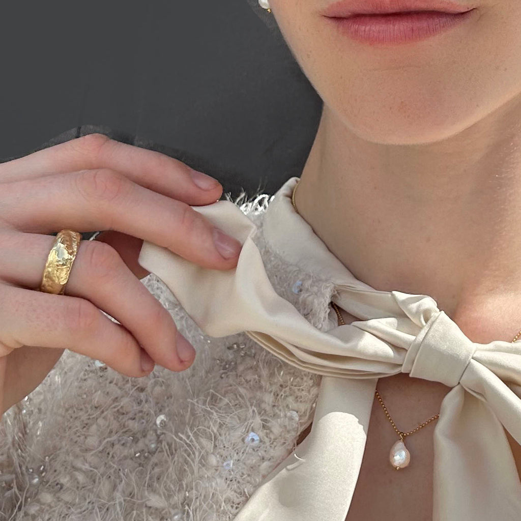 Gold organic band and pearl necklace. desideri design