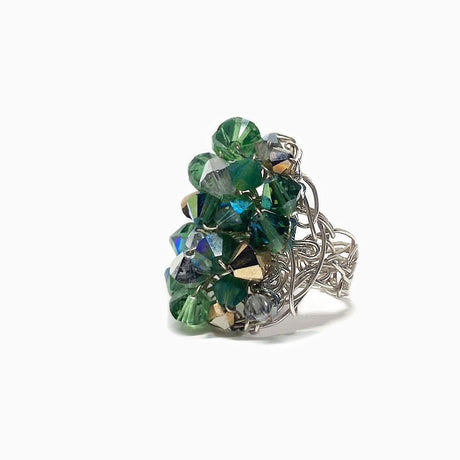 combination of deep colored crystals mounted on sterling silver ring band