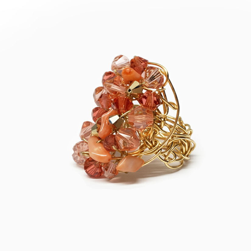 Coral ring with crystals mounted on gold