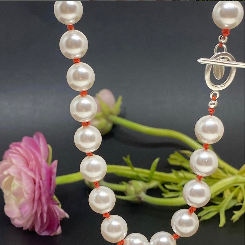 white pearls orange knots by desideri design
