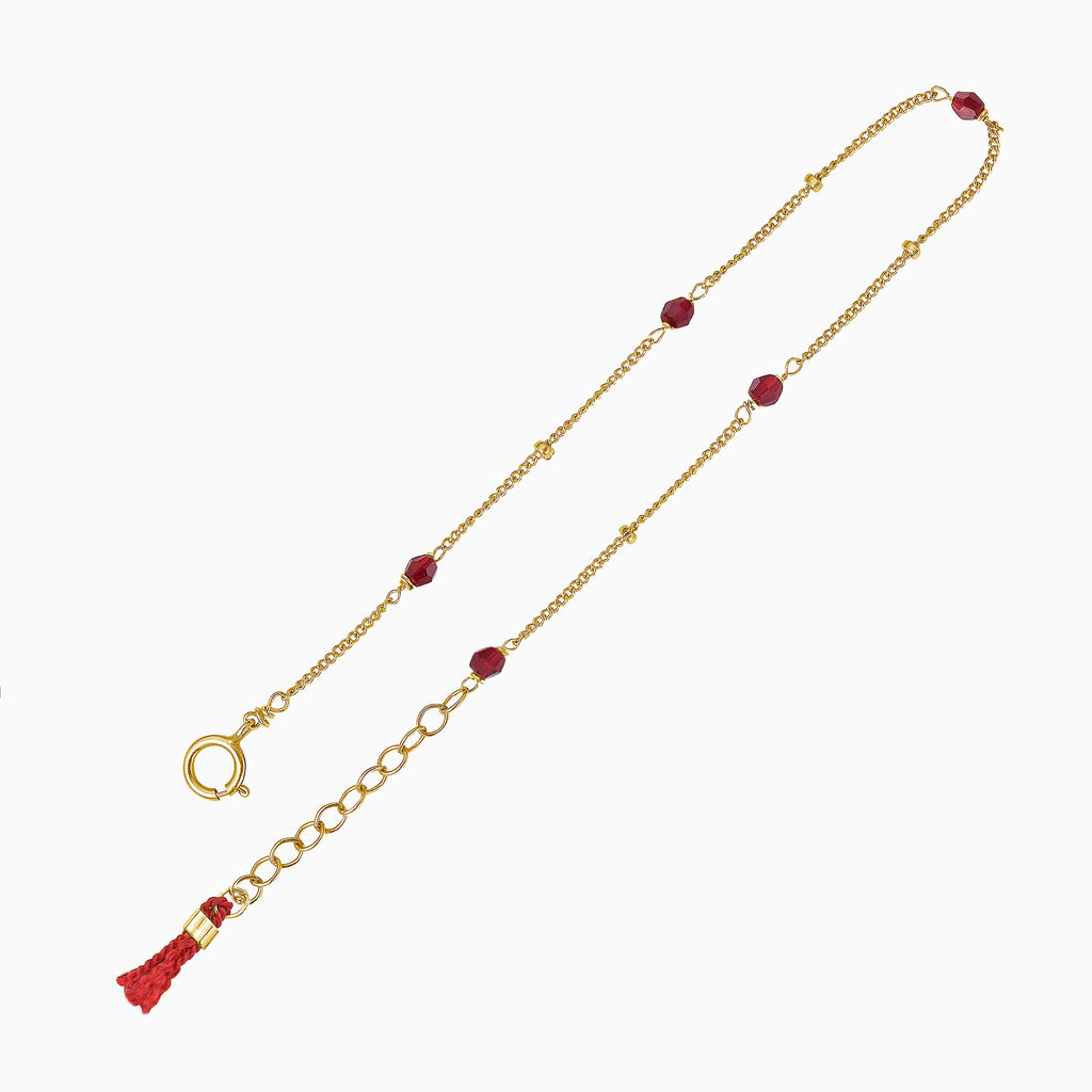 ruby red gold bracelet with silk tassel