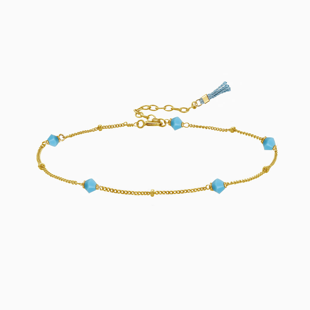 Turquoise and gold bead bracelet with tassel