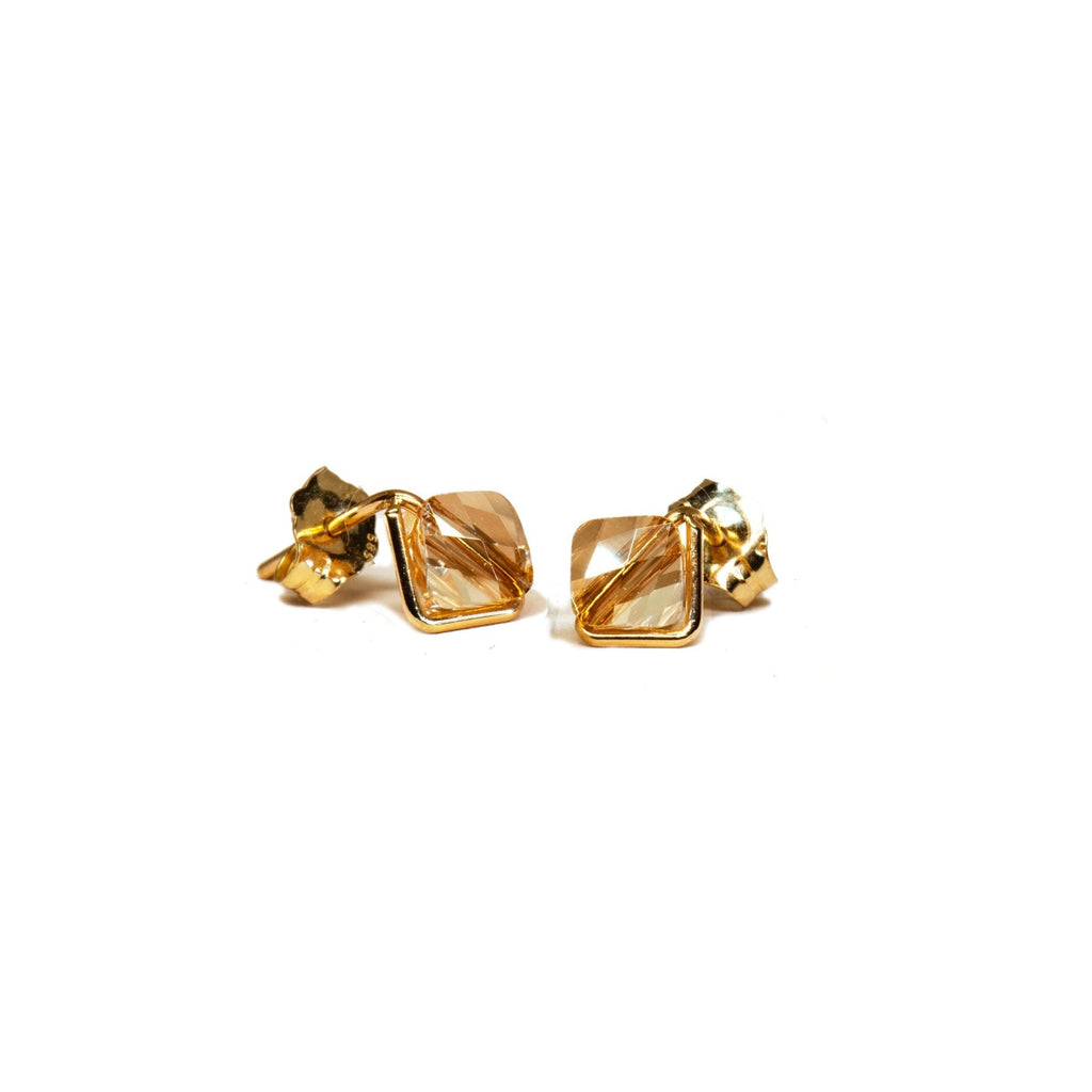 Champagne 14k crystals studs earrings. Desideri design fine jewelry. Citrine topaz color.
