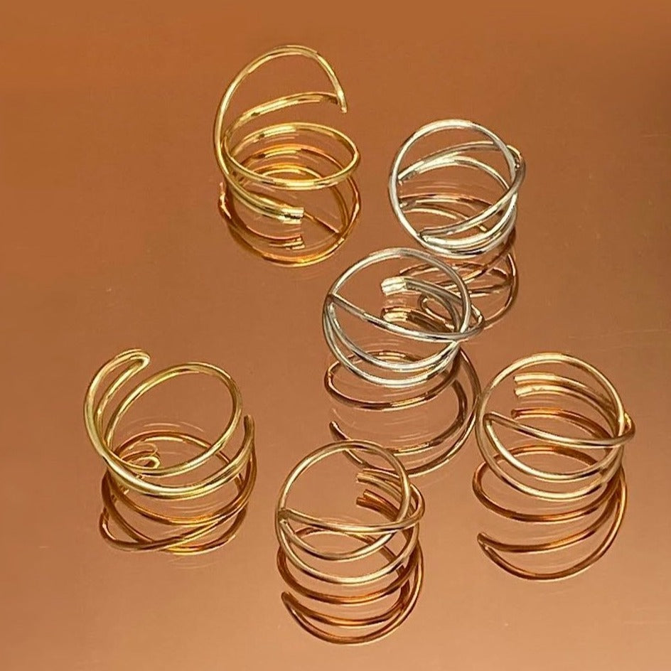 Triple gold and silver band rings
